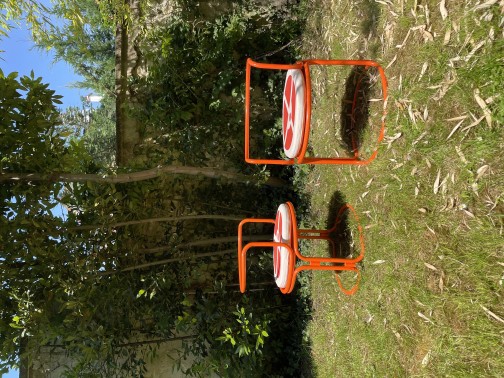 Gae Aulenti, orange lacquered steel armchairs(2)